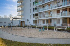 Space for children next to the property building.