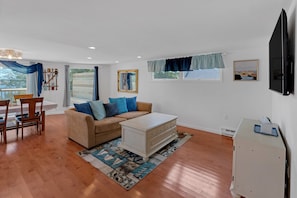 Furniture, Indoors, Living Room, Floor, Flooring