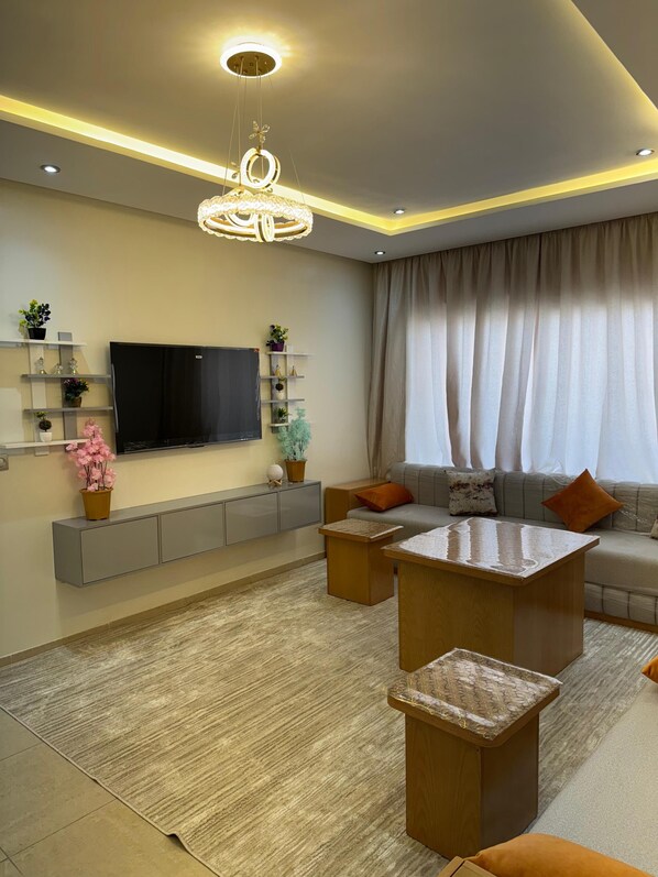 Salon lumineux et spacieux pour porfiter d'une détente en famille.