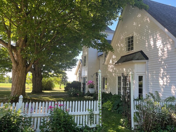 Your residence is the entire clapboard house with views to St. Anne's & Lake Ontario .