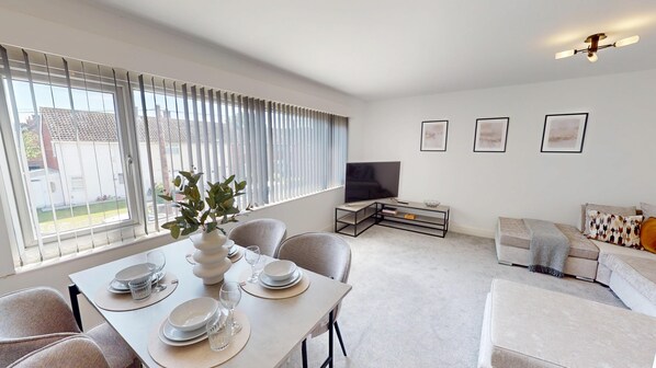 Enjoy our inviting living-dining space: kick back on comfy seating with a Smart TV and gather around the well-equipped dining table—perfect for cosy nights in.