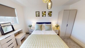 Bedroom 1:
Relax in your private bedroom with a comfy double bed, ample wardrobe space, and a handy dressing desk with mirror—your perfect personal retreat

