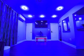 Turn the living room into a relaxing lounge after hours with dynamic lighting.