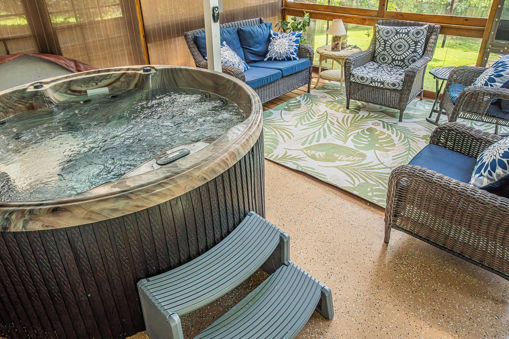 Unwind in the private hot tub on the screened porch — your perfect Smoky Mountain escape.