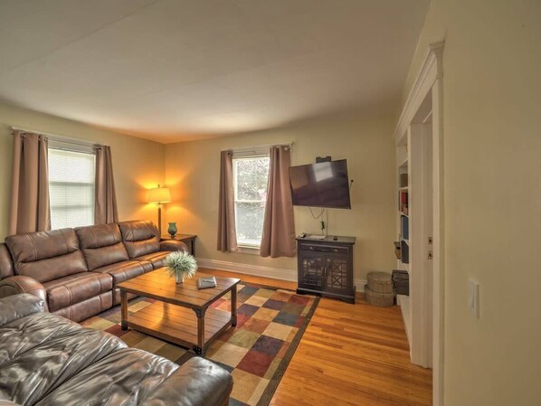 Large Living Room with 50" TV and built in bookcase