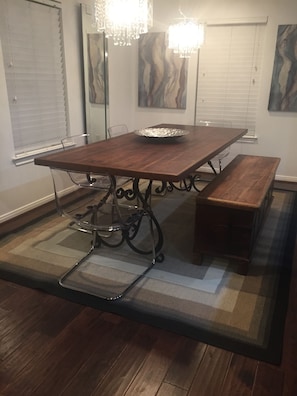 Dining area with seating for six people.