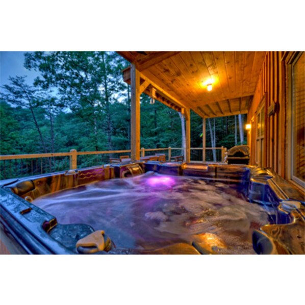 Hot tub with color changing lights overlooking your private woods
