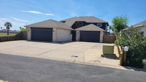 Spacious driveway for vehicles and boat trailers!