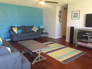 Living Room with 2 sofas and an oversized chair for ample seating.