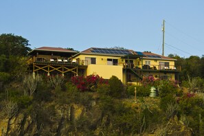 Located on a private cliffside perch, with an 1800 sq foot property-wide deck