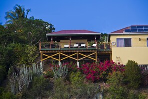 An outdoor lanai, with 1000 sq foot of living space, is nestled in the treetops