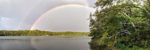 Double rainbow scene taken from the waterfront.