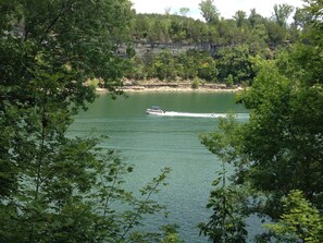 Water View & Passing Boats From Rear Deck Of Cabin.