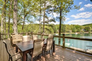 Huge deck overlooking the lake.  Gas grill and seating for 8.  Great for meals.