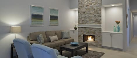 Living Room with stacked stone fireplace