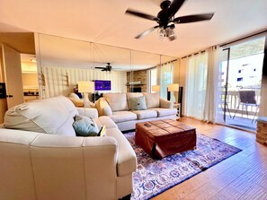 Leather sofa and loveseat with a pull out queen bed in living