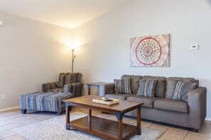 Living room with 50 HDTV and queen size sofa sleeper w/ memory foam mattress