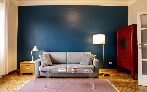 Living room and reclinable sofa bed.