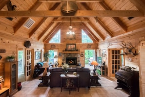 Hand carved canoe over living area.