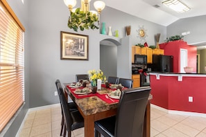 Marble top breakfast table with leather chairs