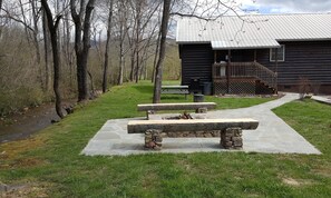 New upgraded rock fire pit and seating area.