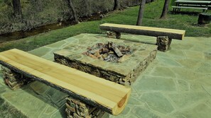 New upgraded rock fire pit and seating area.