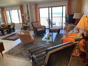 Large, oceanfront,  comfortable living room and dining room 