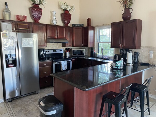 Exclusive, full kitchen with all appliances and granite countertops