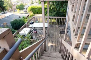 Stairway from back entrance down to back deck and parking