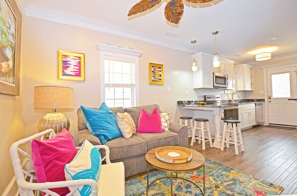 Professional decorated den with a 65 inch TV