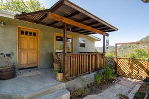 Front Porch, greeting portal to the home, doubling as an inviting outdoor space.