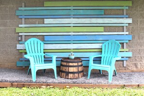 Outdoor seating area with homemade unique decor to enjoy your morning coffee! 