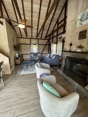 open area living room, fireplace seating and dining area