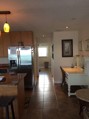 View to the bedroom from the hall. Beautiful views of the Intracoastal this side