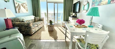 Oceanfront Dolphin Shack living room dining, leather recliner, queen sleeper!