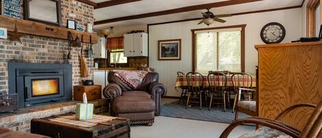 The living area with a wonderful fireplace for cozy nights