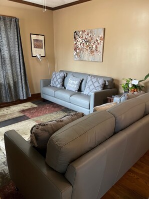 Living Room with brand new leather couches - Dec 2021.  Seats Six