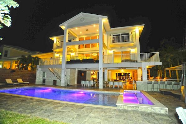 View by the Pool and built in Hot Tub at night.