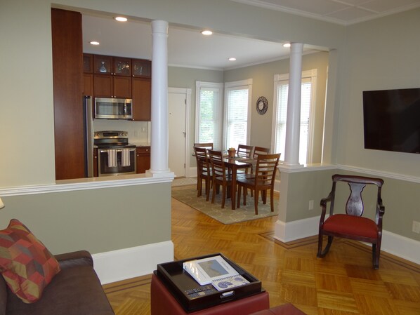 View from the living room couch of the eat in kitchen that seats 6