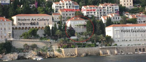 View to the house from the sea. Hotel Excelsior to the left (5 *) and Modern Art 