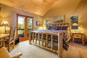 The main suite has a king bed, a desk in case you need to work, and a smart TV