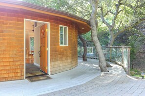 Oak trees were incorporated into the deck, adding to the cottage's character.