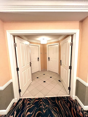Two bedroom suite sharing a common door outside which can be closed for privacy.