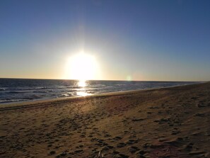 The sun rises up to meet you at Ocean Breeze!