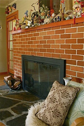Fireplace and art on the mantel