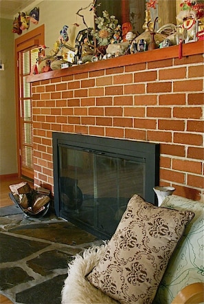 Fireplace and art on the mantel