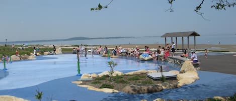 Nelson Park Splash Pad, Playground Bikepath and Beach is just a few houses away.