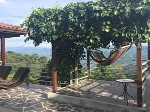 All our guests just love the hammock, surrounded by passion fruit & valley below