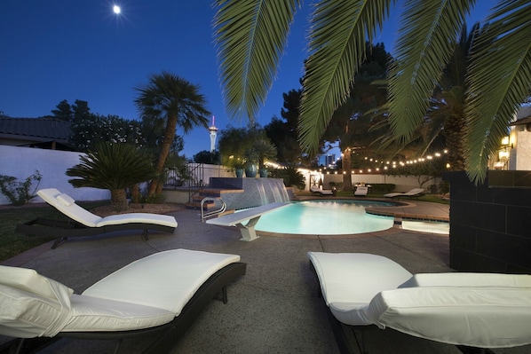 POOL AT NIGHT WITH STRATOSPHERE HOTEL IN VIEW.  SO CLOSE TO THE STRIP!