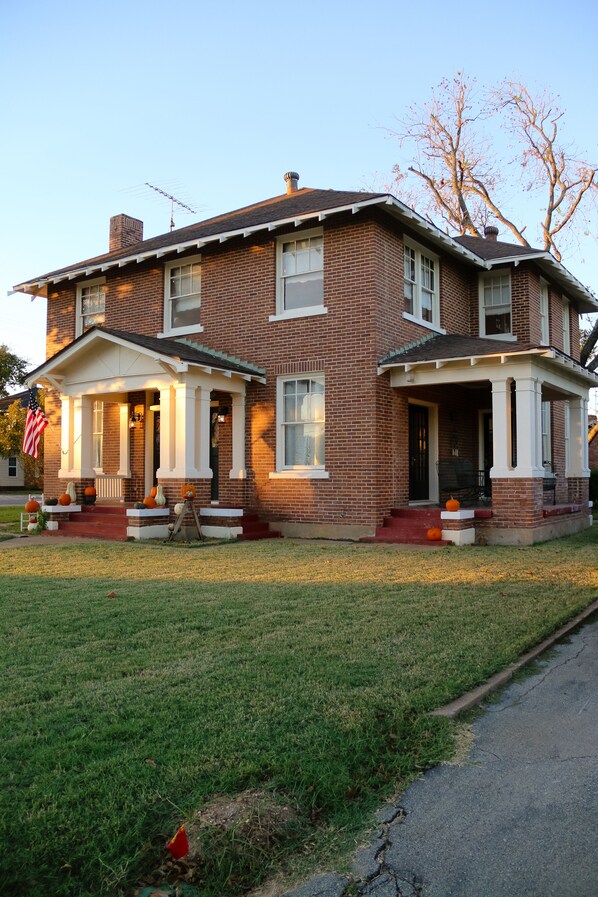 The Oak House, front porch. Side porch with space for dining outside